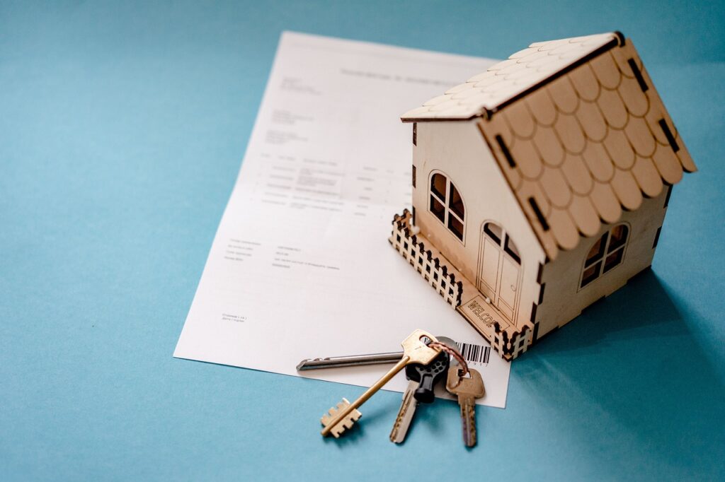 A wooden house with keys.